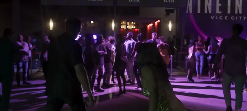 NINE1NINE in GTA VI: Crowds pack the entrance of the NINE1NINE Vice City club under purple lights.