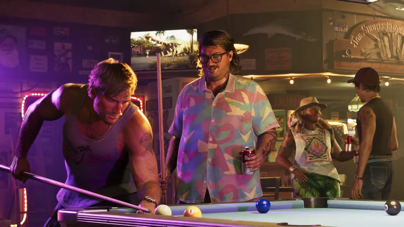 Cal Hampton and Jason at a pool table in a bar.