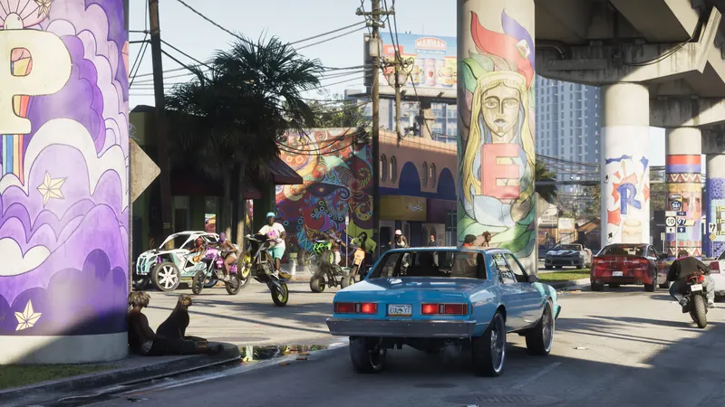 A road in Vice City where cars are driving and people on dirt bikes and ATVs are performing tricks.